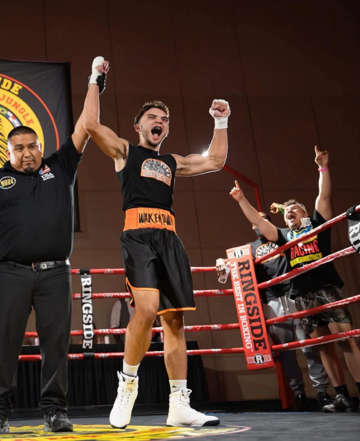 Sam Ironman Bell celebrating an amateur boxing victory in the ring