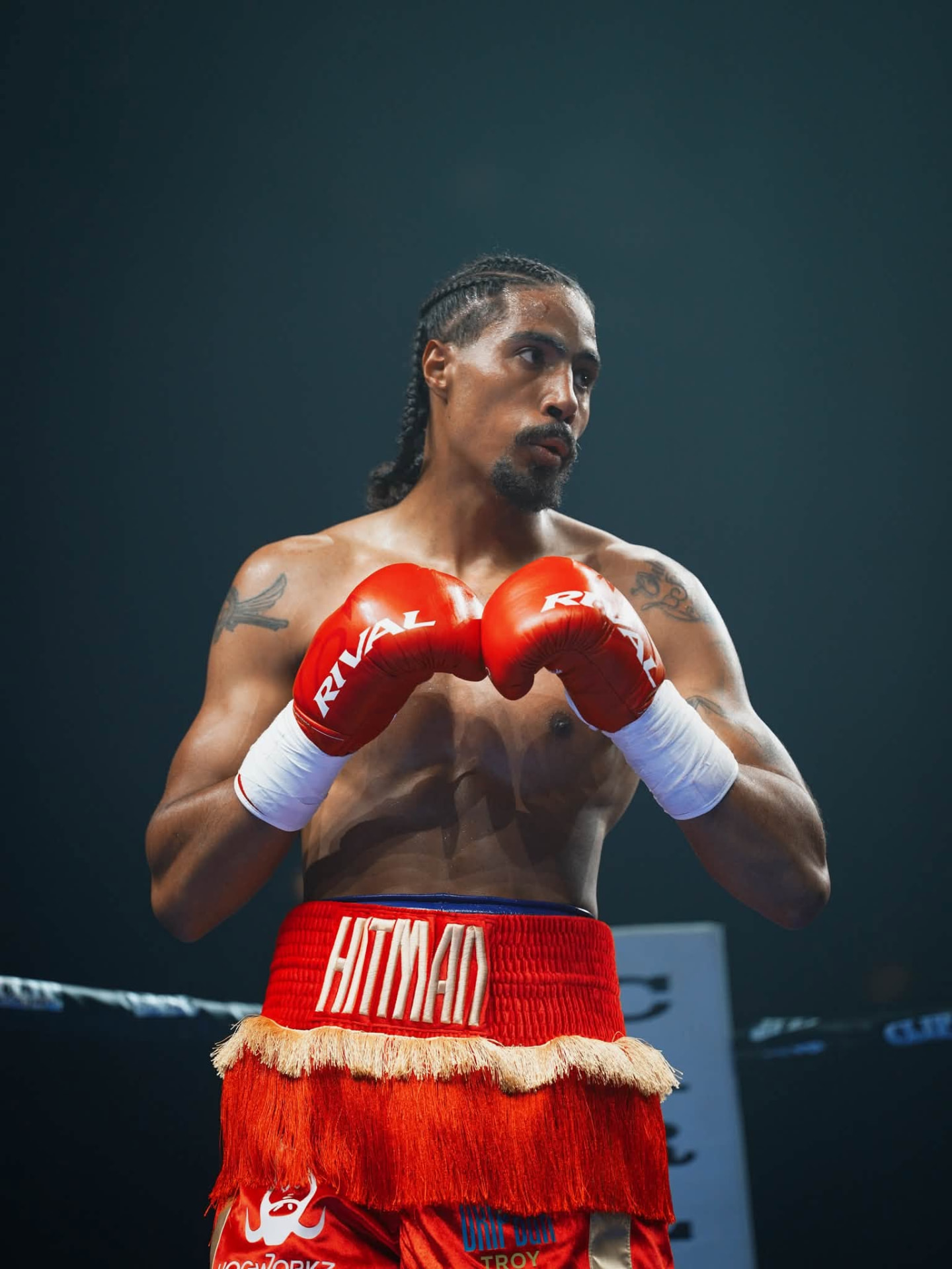 A PunchTown fighter in a fighting stance with red gloves